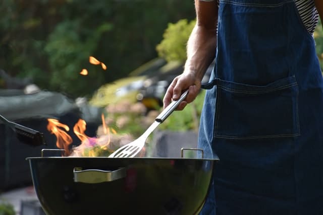 Pan cooking over a campfire.